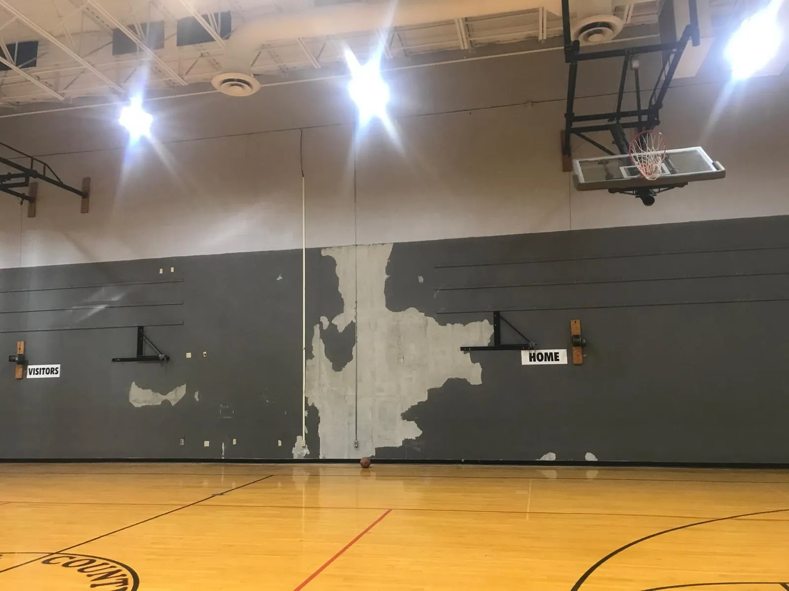 Before — School gym wall restoration
