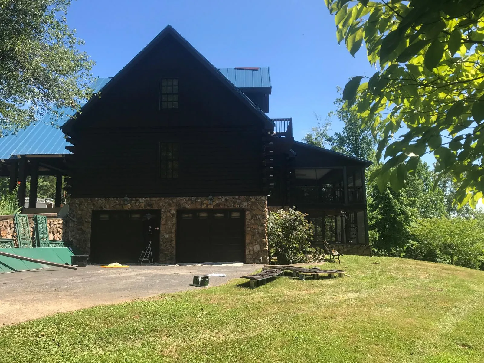 Three-story log home full restain